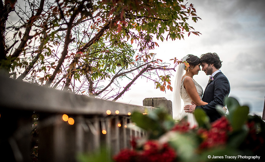 A happy couple enjoy the outdoor space at this country wedding venue